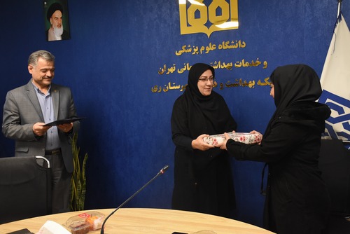 تجلیل از دو همکار شبکه بهداشت و درمان شهرستان ری به مناسبت بازنشستگی